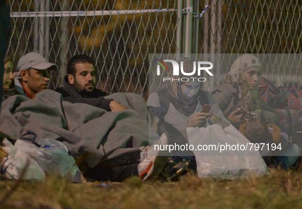 Houndreds of migrants awaiting to enter to the transfer camp in Opatovac near the border crossing point between Serbia and Croatia, on Septe...