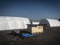 In the industrial park in nearby Solomonovo there is a tent camp being built. The Swedish government brought twenty hangars and equipment on...