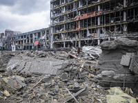 Shelling in a Kyiv neighbourhood has devastated a shopping centre, leaving a flattened ruin. Eight people were killed as a result of this sh...