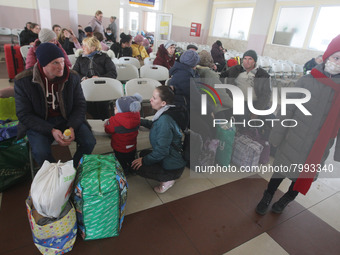 Ukrainian refugees evacuated from Mykolaiv arrived at Odesa railway station, after Russian strike hits a regional government building in Myk...