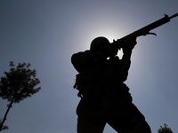 An Indian Army Soldier takes position at a Forward Post at LoC Line Of Control in Uri, Baramulla, Jammu and Kashmir, India on 02 April 2022....