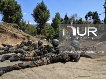 Indian army soldiers shoots a target during a practice session at a Forward Post at LoC Line Of Control in Uri, Baramulla, Jammu and Kashmir...