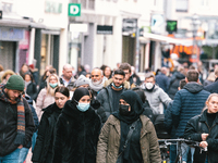 shoppers are seen, some with masks and some without masks  in city center of Bonn, Germany on April 2, 2022 as many rules of covid 19 will b...