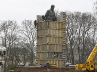 Communal workers and Volunteers protect the Taras Shevchenko monument from possible destructions as Russia's invasion of Ukraine continues,...