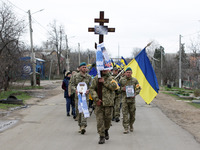 Relatives and friends of died Ukrainian serviceman Sergii Shamut (21 y.o.) attend his funeral ceremony, amid Russia's invasion of Ukraine, a...