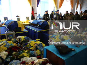 IVANO-FANKIVSK REGOIN, UKRAINE - APRIL 04, 2022 - Coffins are seen during a funeral ceremony for Ukrainian defenders, brothers Roman and Leo...