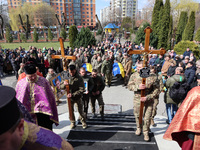 IVANO-FANKIVSK REGOIN, UKRAINE - APRIL 04, 2022 - Soldiers carry crosses during a funeral ceremony for Ukrainian defenders, brothers Roman a...