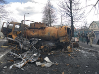 Street with destroyed Russian military machinery in the recaptured by the Ukrainian army Bucha city near Kyiv, Ukraine, 04 April 2022. (