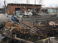 A general view of a street with destroyed buildings and civil car in the recaptured by the Ukrainian army Gostomel city near Kyiv, Ukraine,...