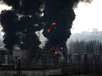 ODESA, UKRAINE - APRIL 3, 2022 - A fire rages after Russian rockets hit an oil refinery and an oil depot, Odesa, southern Ukraine.  (