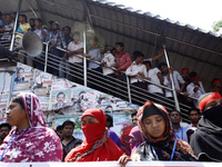 Garment workers take part in a rally in front of press club organized by United Federation of Garment Workers in Dhaka, on April 11, 2014 de...