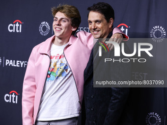 Jacob Bertrand and Ralph Macchio arrive at the 2022 PaleyFest LA - Netflix's 'Cobra Kai' held at the Dolby Theatre on April 8, 2022 in Holly...