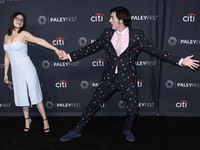 Melissa Rivera and Gianni DeCenzo arrive at the 2022 PaleyFest LA - Netflix's 'Cobra Kai' held at the Dolby Theatre on April 8, 2022 in Holl...