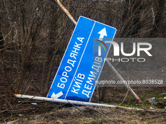 KYIV REGION, UKRAINE - A broken road sign is seen near the city liberated from the russian occupiers, Hostomel, Kyiv Region, north-central U...