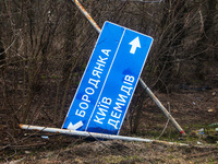 KYIV REGION, UKRAINE - A broken road sign is seen near the city liberated from the russian occupiers, Hostomel, Kyiv Region, north-central U...