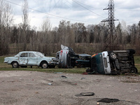 KYIV REGION, UKRAINE - Damaged cars are seen in the city liberated from the russian occupiers, Hostomel, Kyiv Region, north-central Ukraine...