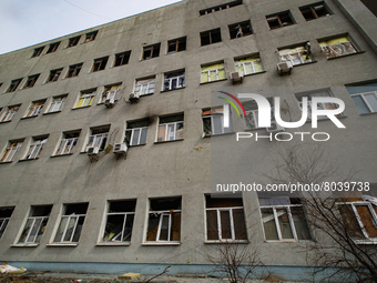 KYIV REGION, UKRAINE - APRIL 08, 2022 - A building damaged by the enemy shelling in the city liberated from the russian occupiers, Hostomel,...