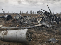 Fragments of a Russian military helicopter Mi-8 near Makariv, Kyiv area, Ukraine, Saturday, April 9, 2022 (