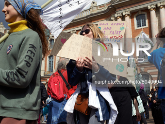 The march in front of the townhall of Toulouse. The placard reads 'We have only one planet, love her and all species living on it'. The day...