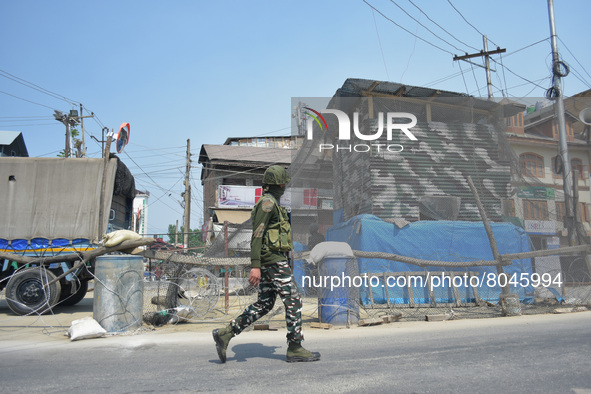 Indian paramilitary troopers arrive at an encounter site in in Srinagar, Indian Administered Kashmir on 10 April 2022. Two foreign militants...