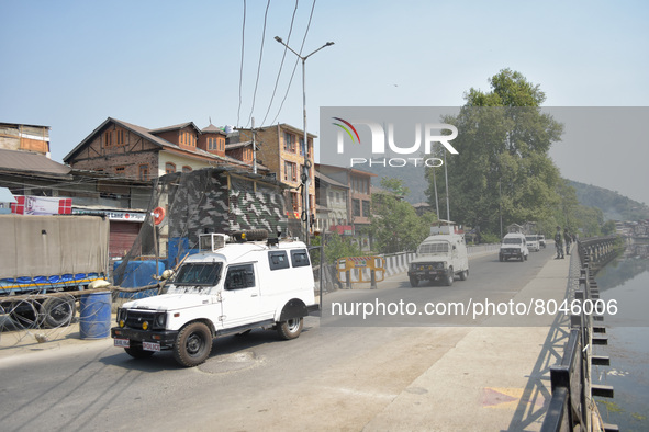 Indian paramilitary troopers arrive at an encounter site in in Srinagar, Indian Administered Kashmir on 10 April 2022. Two foreign militants...