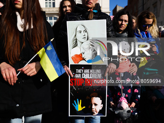 People attend 'Mothers' March' as part of Stand with Ukraine international protest, in Krakow, Poland on April 10, 2022. Ukrainian mothers a...
