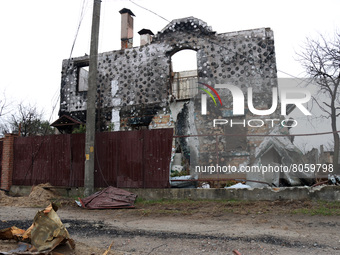 KYIV REGION, UKRAINE - APRIL 9, 2022 - A building shows damage caused by the shelling of Russian invaders, Kyiv Region, northern Ukraine. (