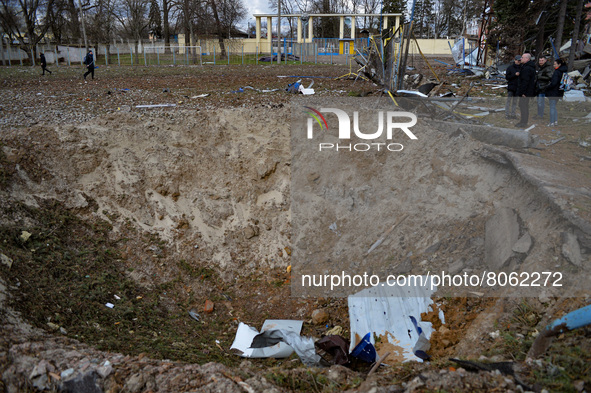 CHERNIHIV, UKRAINE - APRIL 11, 2022 - A huge crater is pictured on the pitch of the Chernihiv Olympic Sports Training Centre (formerly Yuri...