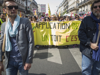 Protesters take part in a demonstration against austerity on April 12, 2014 in Paris.  The protest march against the government's austerity...