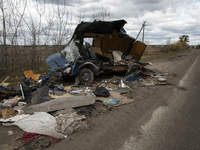 Destroyed car on the road near the village of Andriyivka Kyiv region, on April 12, 2022. 
About a month later, the village was occupied by R...