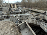 KYIV REGION, UKRAINE - APRIL 12, 2022 - Bridge destroyed by the russian troops on March 31 during their retreat, Ivankiv village, Kyiv Regio...