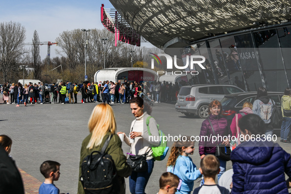 Refugees from Ukraine who fled to Poland after Russian attack are seen waiting in a line to a cash enrolment centre opened by UNHCR, the UN...