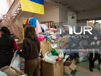 Ukrainian volunteers are seen working inside the local school n˚117 converted in the Humanitarian Volunteer Center, in the city center of Od...