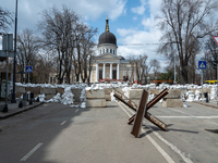 Barricades made of cement blocks, iron structures and sand bags, in the streets of the center in Odessa, Ukraine. (