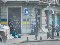Ukrainian citizens are seen in the streets of the center in Odessa, Ukraine. (