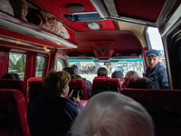 Ukrainian refugees are seen inside the bus headed to Chisinau, Moldova, at the border Ukrainian side of the border of Palanca, Moldova/Ukrai...