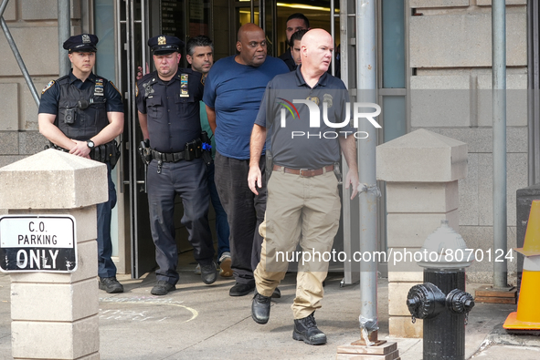 Suspect Frank James is led by police from Ninth Precinct after being arrested for his connection to the mass shooting at the 36th St subway...