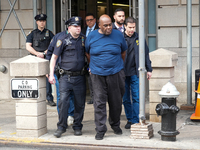 Suspect Frank James is led by police from Ninth Precinct after being arrested for his connection to the mass shooting at the 36th St subway...