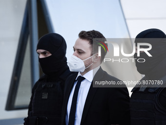 Babis Anagnostopoulos arrives at the court escorted by police for his trial on April 14, 2022 in Athens, Greece. On June 17th 2021 Babis Ana...