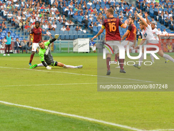 Roma’s defender Kostas Manolas kicks gol 1 -0 during the Italian Serie A football match A.S. Roma vs Carpi at the Olympic Stadium in Rome, o...