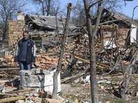 Local resident  Sergii shows his house destroyed by shelling russian army in a village in the north of Kyiv, Ukraine, 14 April 2022 (