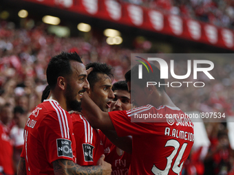 Benfica's forward Jonas  (2nd L) celebrates his goal with his teammates during the Portuguese League  football match between SL Benfica and...