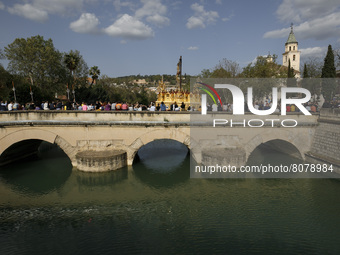 The image of Christ of Expiration crosses a bridge over the Genil river during the Good Friday in Granada, Spain, on April 15, 2022.Holy We...