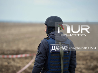 KYIV REGION, UKRAINE - APRIL 21, 2022 - A sapper of the State Emergency Service is pictured during a mine clearance mission near Bervytsia,...