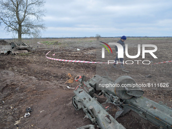 KYIV REGION, UKRAINE - APRIL 21, 2022 - A sapper scans the ground for explosives during a mine clearance mission near Bervytsia, a village l...