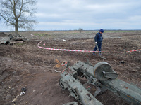 KYIV REGION, UKRAINE - APRIL 21, 2022 - A sapper scans the ground for explosives during a mine clearance mission near Bervytsia, a village l...