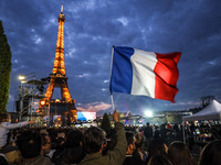 Supporters gathering at Champ de Mars after the victory of Emmanuel Macron in the French presidential elections. (