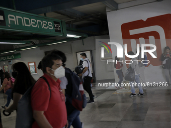 Passers-by inside the Constitutción de 1917 metro station in Mexico City, where the AstraZeneca biological is being applied to people who ha...