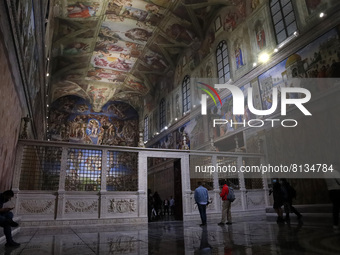 A person takes a photo in a tour , during the visit of the  Secretary of State of the Holy See Cardinal Pietro Parolin at the replica of the...