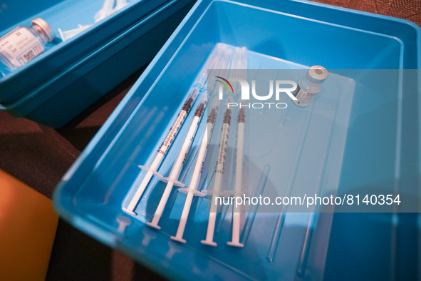  Syringes filled with COVID-19 vaccine sit on a table at a vaccination centre in Doncaster on 28 April. 